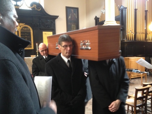 Coffin bearers file past-2